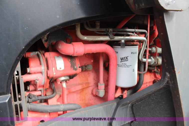 image for item H6910 1999 Ford New Holland TS100 tractor