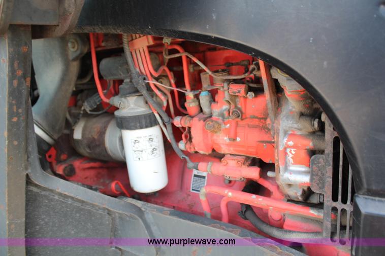 image for item H6910 1999 Ford New Holland TS100 tractor