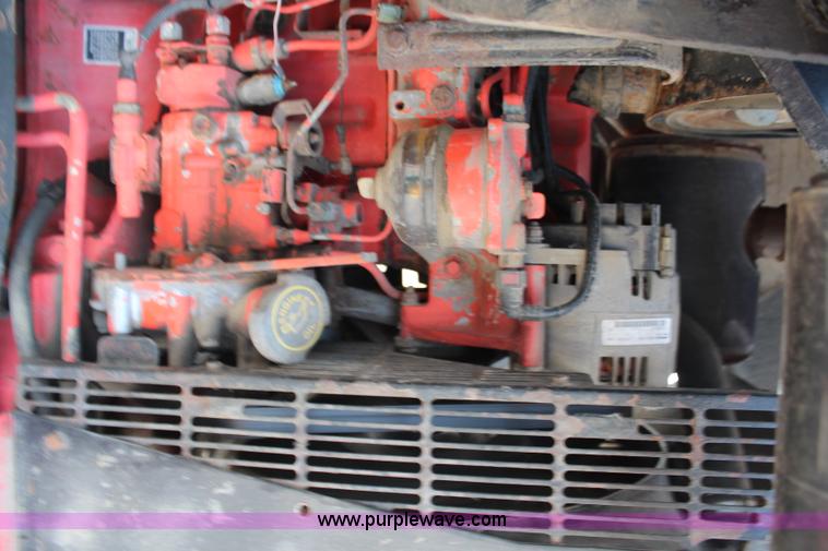 image for item H6910 1999 Ford New Holland TS100 tractor