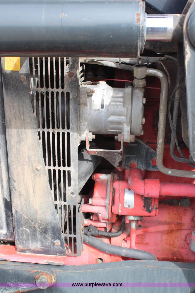 image for item H6910 1999 Ford New Holland TS100 tractor