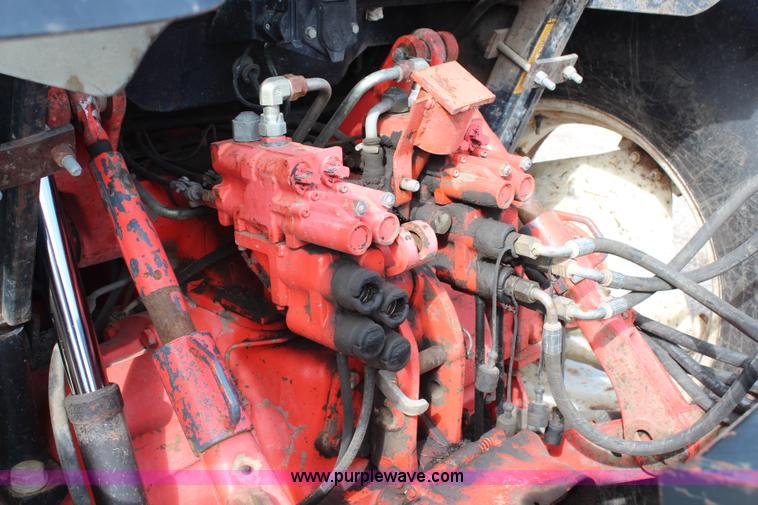 image for item H6910 1999 Ford New Holland TS100 tractor