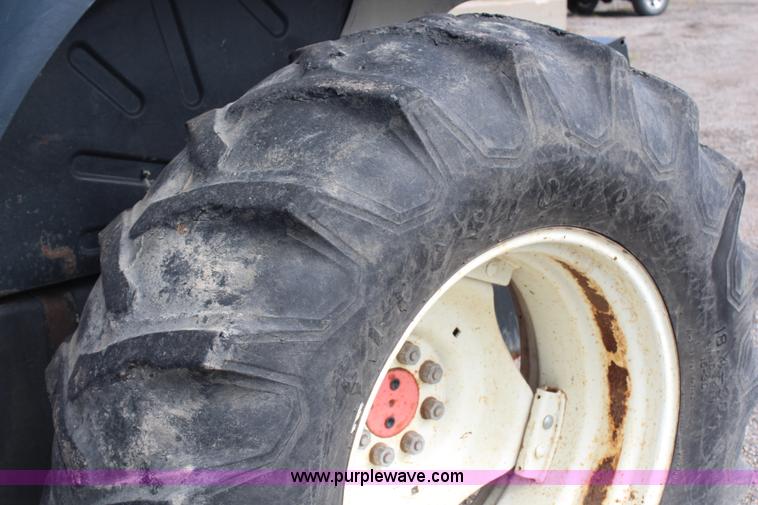 image for item H6910 1999 Ford New Holland TS100 tractor