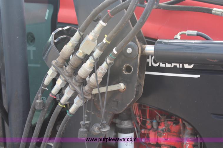 image for item H6910 1999 Ford New Holland TS100 tractor