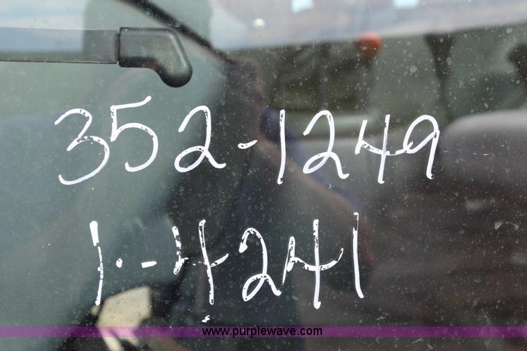 image for item H6910 1999 Ford New Holland TS100 tractor