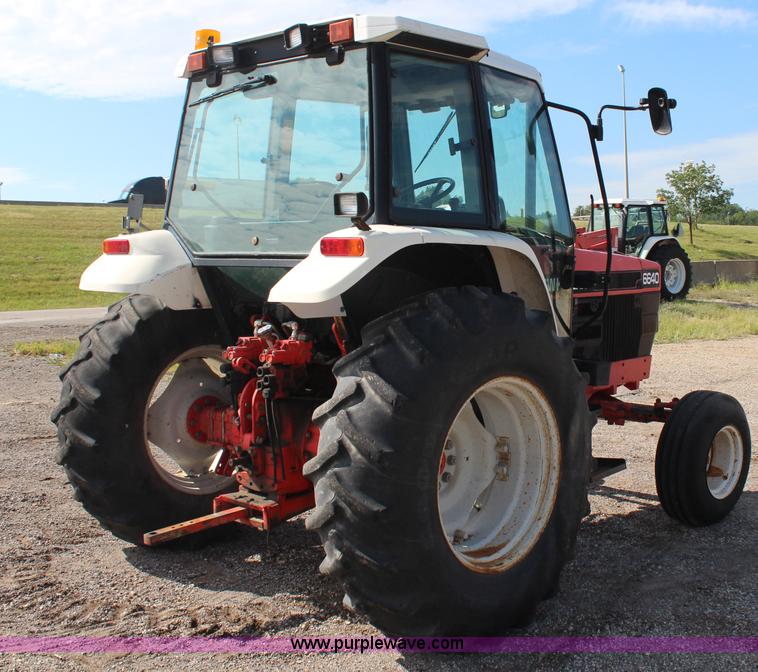 image for item H6920 1998 New Holland 6640SL tractor