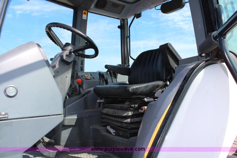 image for item H6920 1998 New Holland 6640SL tractor