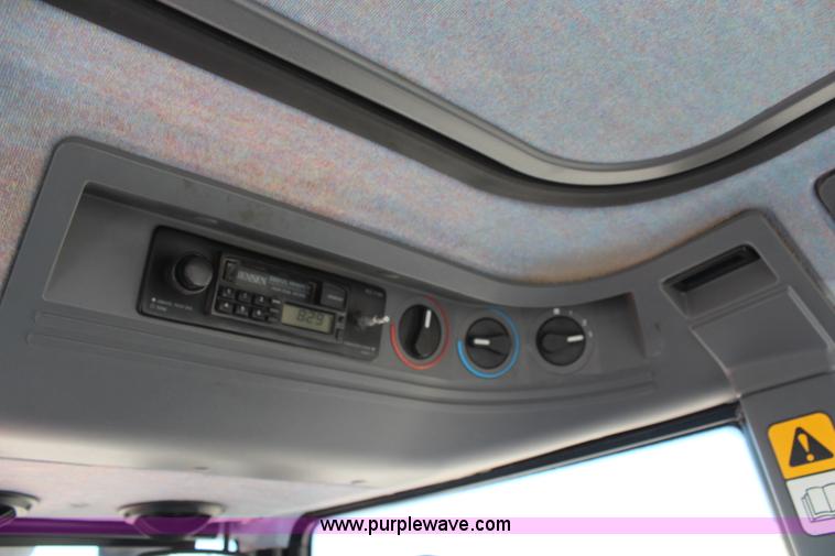 image for item H6920 1998 New Holland 6640SL tractor