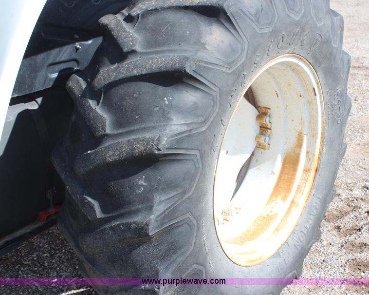 image for item H6920 1998 New Holland 6640SL tractor