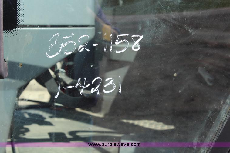 image for item H6920 1998 New Holland 6640SL tractor