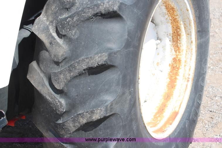 image for item H6921 1998 Ford New Holland 6640SL tractor