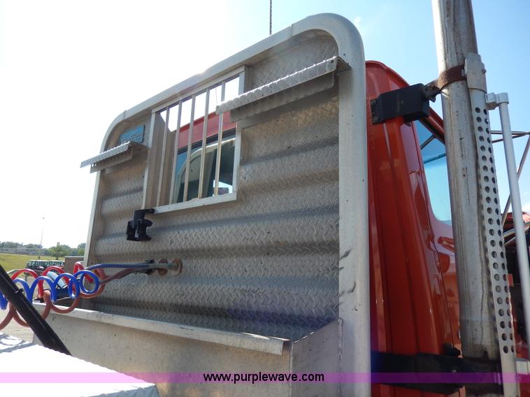 image for item H6945 1997 Ford LTS9000 semi truck