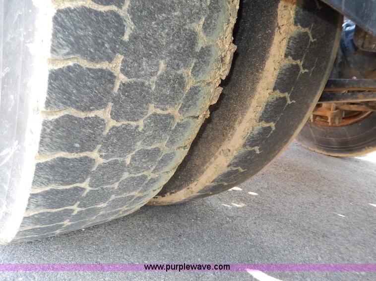 image for item H6947 2003 Freightliner FL112 semi truck