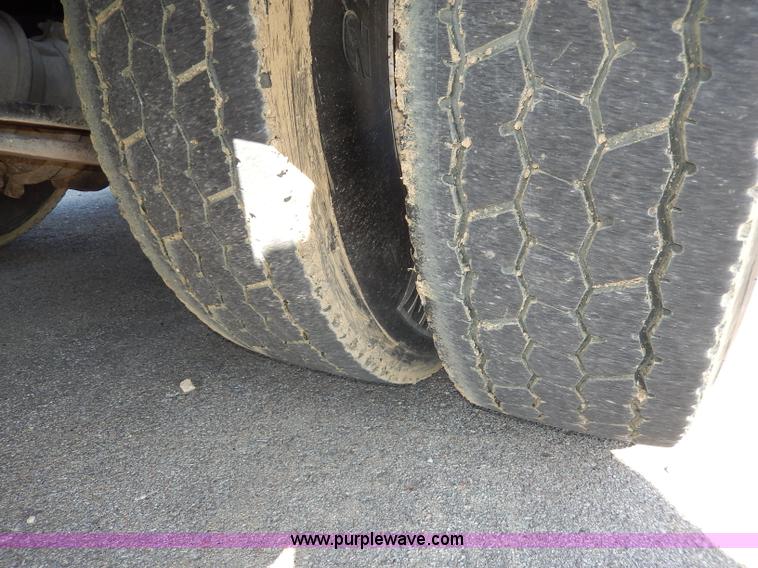 image for item H6947 2003 Freightliner FL112 semi truck