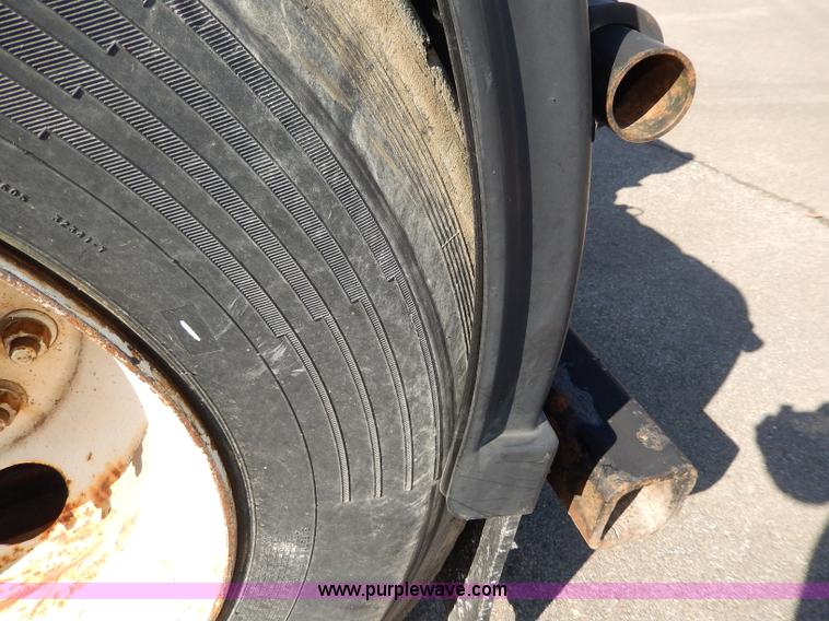 image for item H6947 2003 Freightliner FL112 semi truck