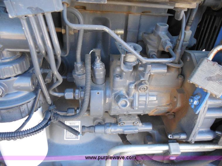 image for item I1366 2001 Ford TS100 tractor