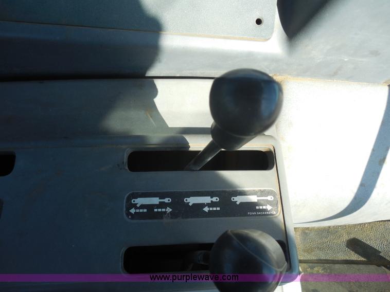 image for item I1368 1998 Ford 7740SL MFWD tractor