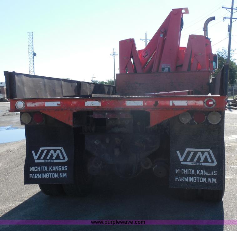 image for item I1378 1994 Ford LNT8000 tilt bed truck