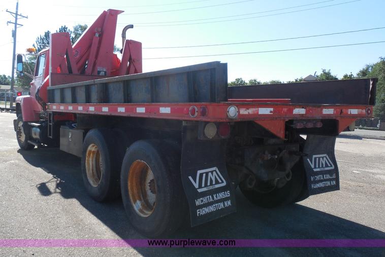 image for item I1378 1994 Ford LNT8000 tilt bed truck