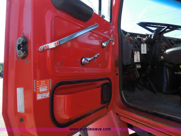 image for item I1378 1994 Ford LNT8000 tilt bed truck