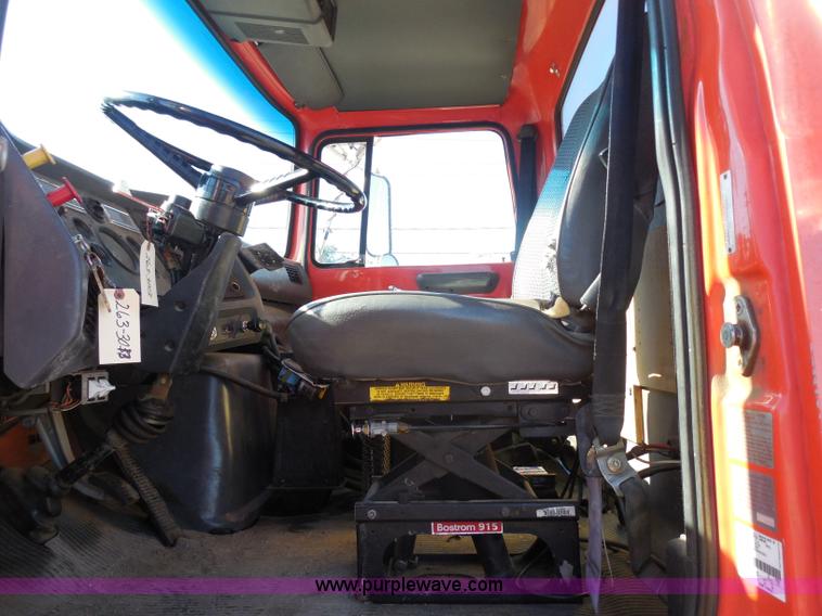 image for item I1378 1994 Ford LNT8000 tilt bed truck