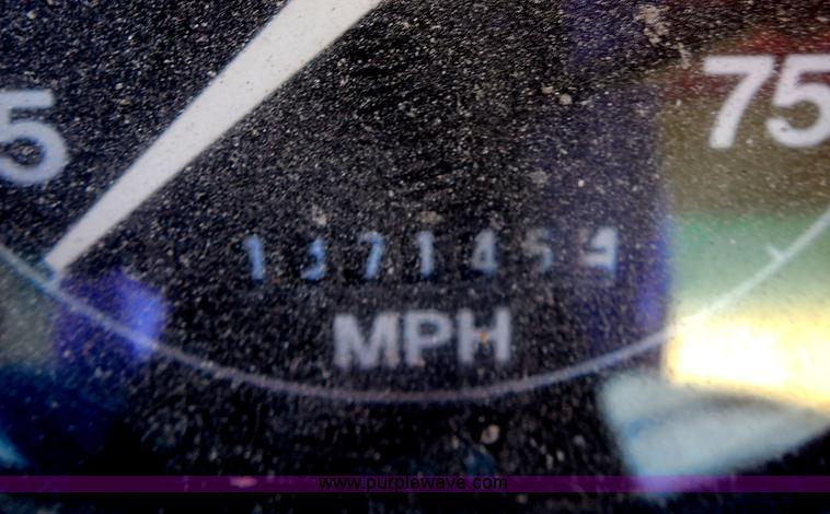 image for item I1378 1994 Ford LNT8000 tilt bed truck