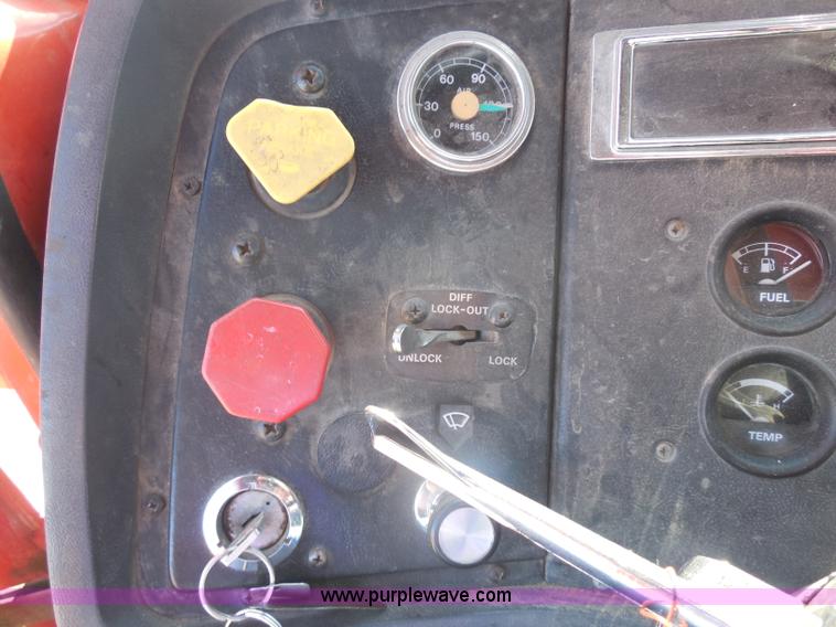 image for item I1378 1994 Ford LNT8000 tilt bed truck