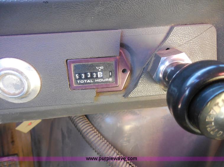 image for item I1378 1994 Ford LNT8000 tilt bed truck