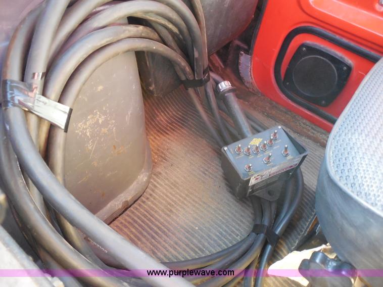 image for item I1378 1994 Ford LNT8000 tilt bed truck