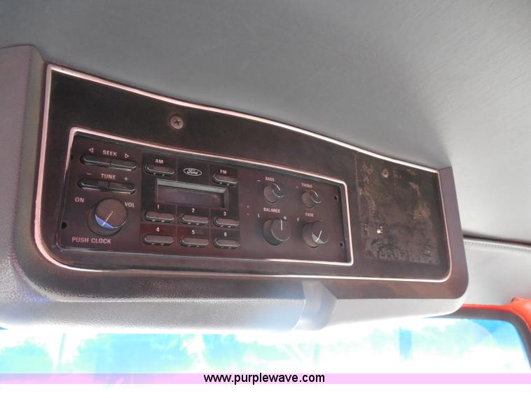 image for item I1378 1994 Ford LNT8000 tilt bed truck