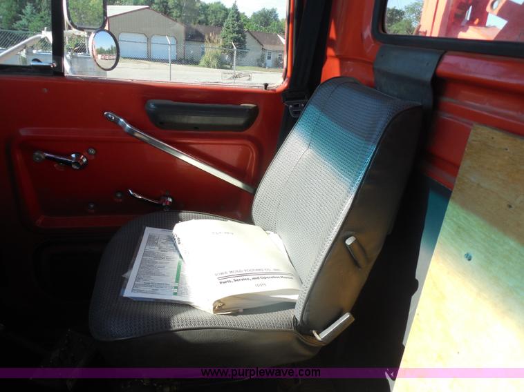 image for item I1378 1994 Ford LNT8000 tilt bed truck