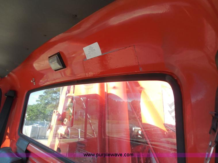 image for item I1378 1994 Ford LNT8000 tilt bed truck