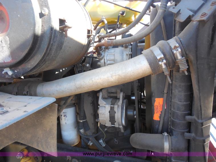 image for item I1378 1994 Ford LNT8000 tilt bed truck