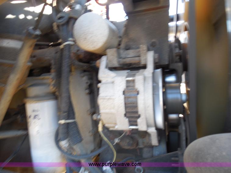 image for item I1378 1994 Ford LNT8000 tilt bed truck