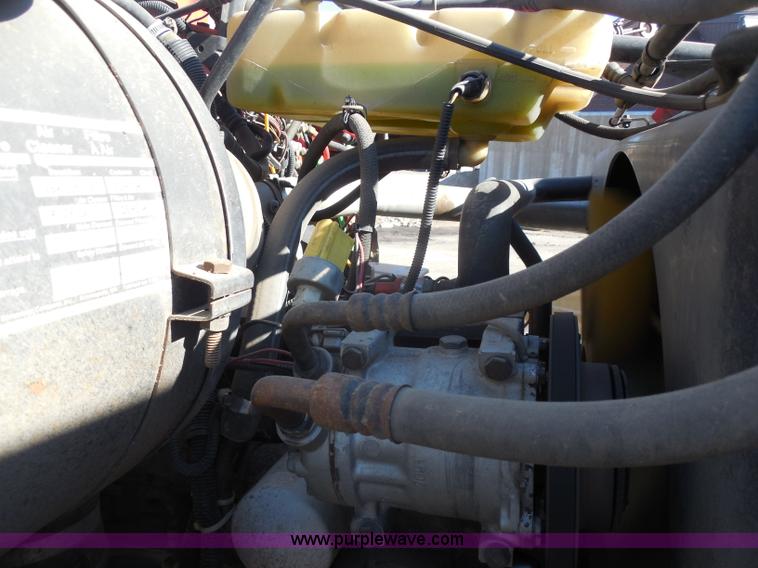 image for item I1378 1994 Ford LNT8000 tilt bed truck