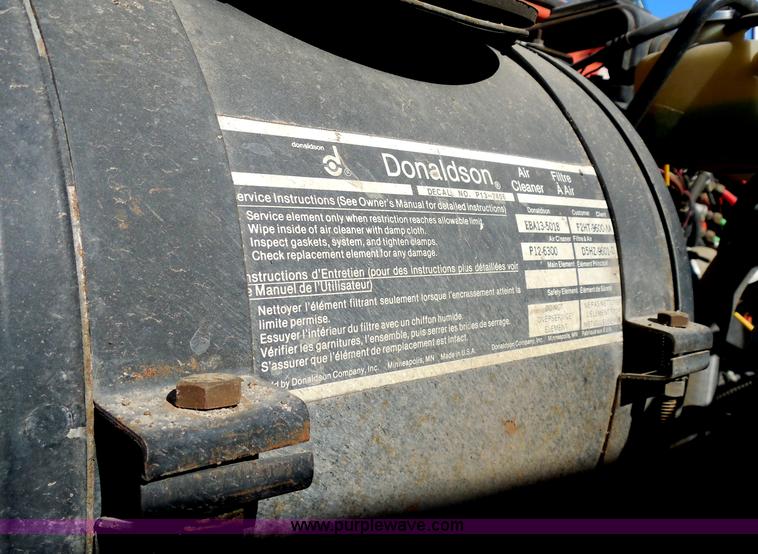 image for item I1378 1994 Ford LNT8000 tilt bed truck