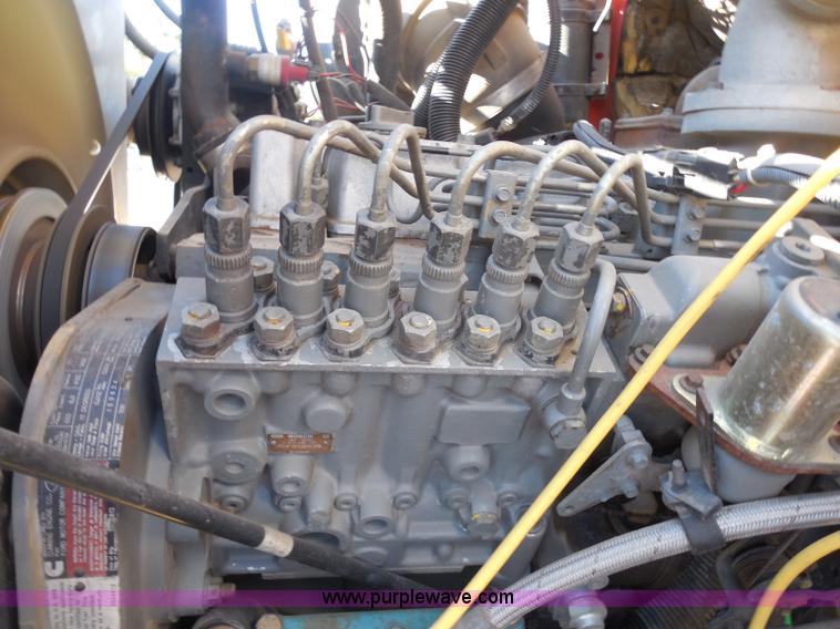 image for item I1378 1994 Ford LNT8000 tilt bed truck