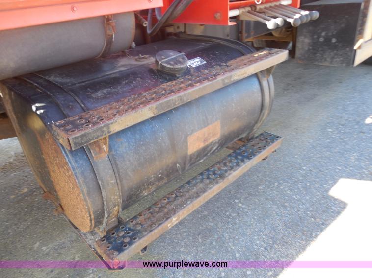 image for item I1378 1994 Ford LNT8000 tilt bed truck