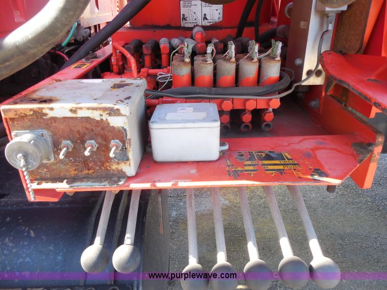 image for item I1378 1994 Ford LNT8000 tilt bed truck