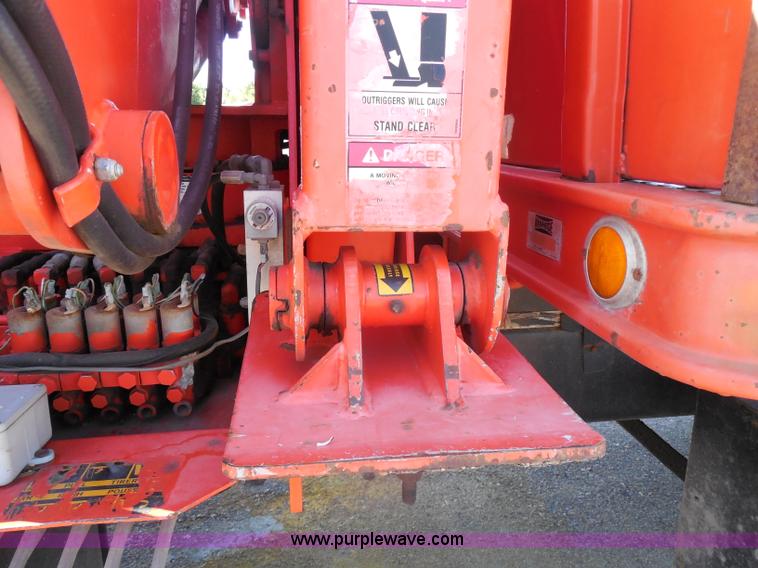 image for item I1378 1994 Ford LNT8000 tilt bed truck