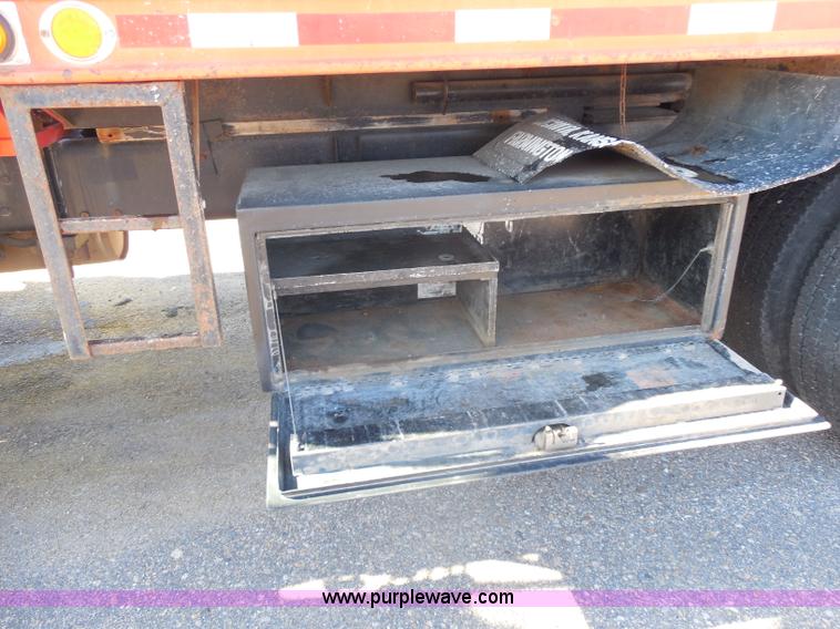 image for item I1378 1994 Ford LNT8000 tilt bed truck