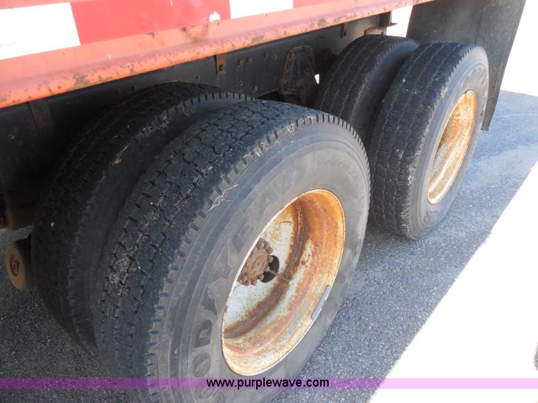 image for item I1378 1994 Ford LNT8000 tilt bed truck