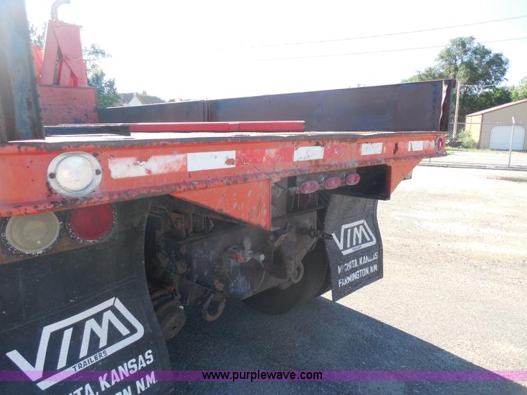 image for item I1378 1994 Ford LNT8000 tilt bed truck