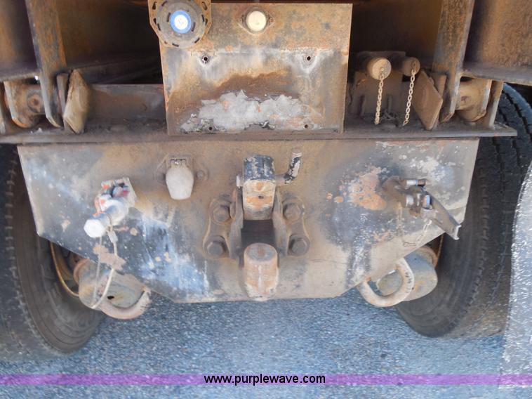 image for item I1378 1994 Ford LNT8000 tilt bed truck