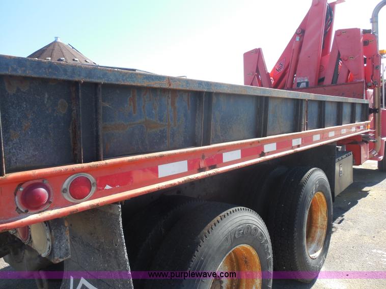 image for item I1378 1994 Ford LNT8000 tilt bed truck