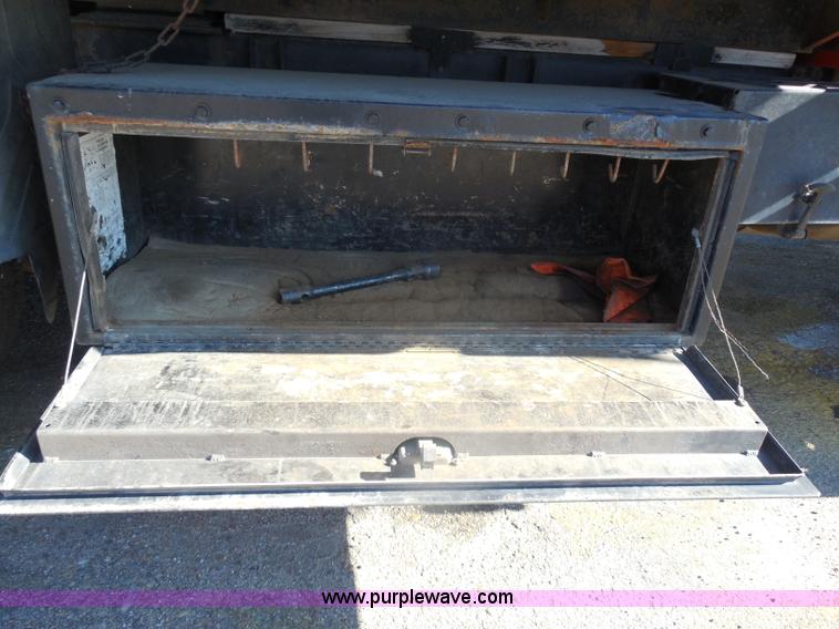 image for item I1378 1994 Ford LNT8000 tilt bed truck