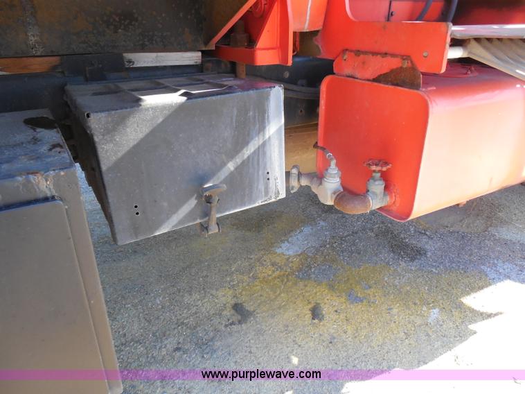 image for item I1378 1994 Ford LNT8000 tilt bed truck