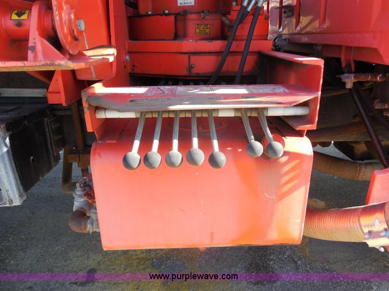 image for item I1378 1994 Ford LNT8000 tilt bed truck