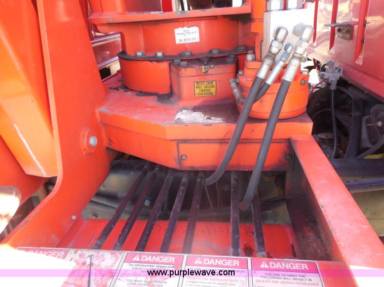 image for item I1378 1994 Ford LNT8000 tilt bed truck