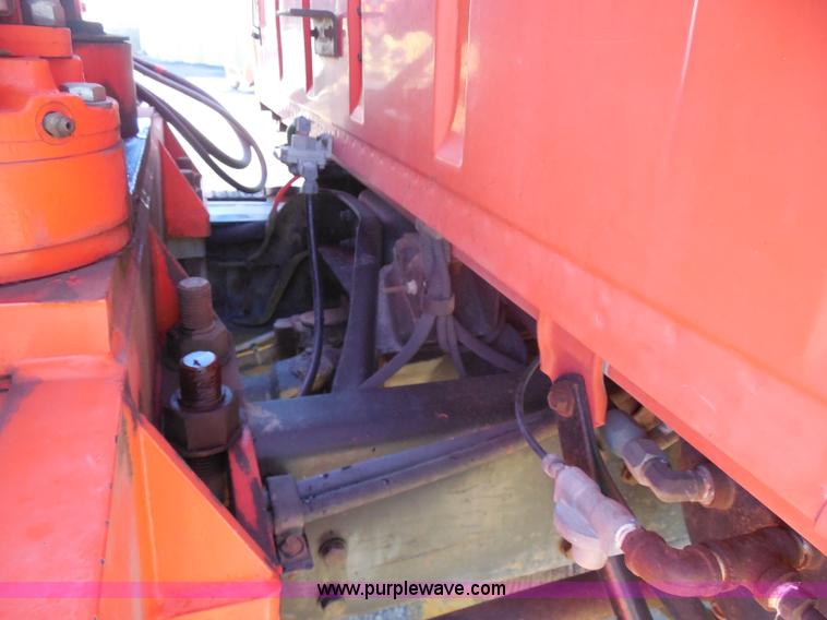 image for item I1378 1994 Ford LNT8000 tilt bed truck