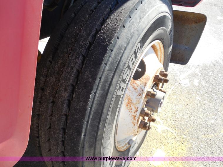 image for item I1378 1994 Ford LNT8000 tilt bed truck